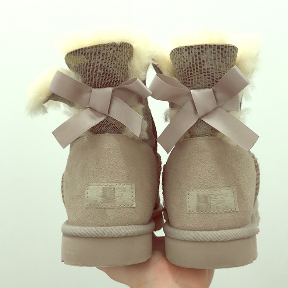 UGG Shoes - Ugg snake print with bow boots Sz. 7